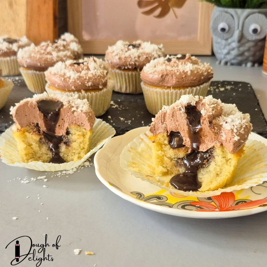 coconut chocolate custard cupcake with chocolate swiss meringue frosting