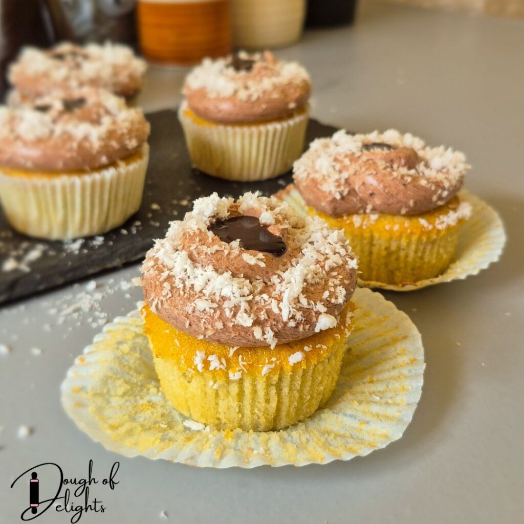 soft coconut cupcake with creamy chocolate filling