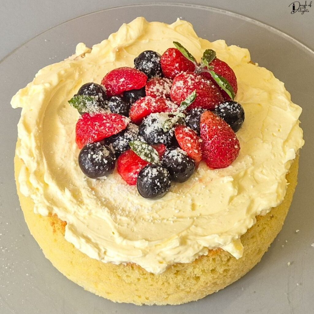Homemade Coconut Sponge Cake with a light, airy crumb and subtle coconut flavour.