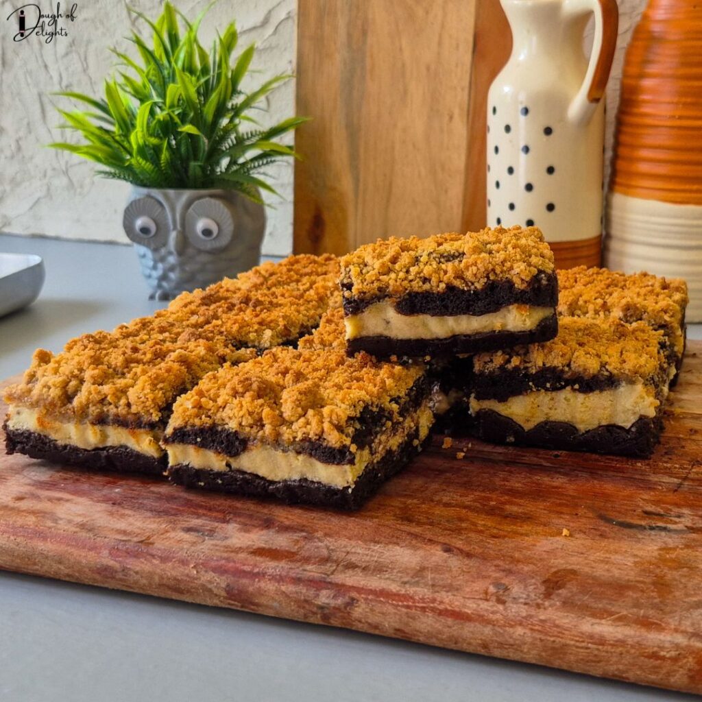 Brownie Cheesecake Bars with almond crumble